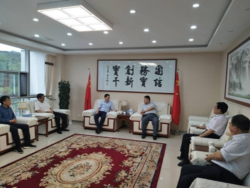 司正林、王寧一行到建莊礦業進行座談交流